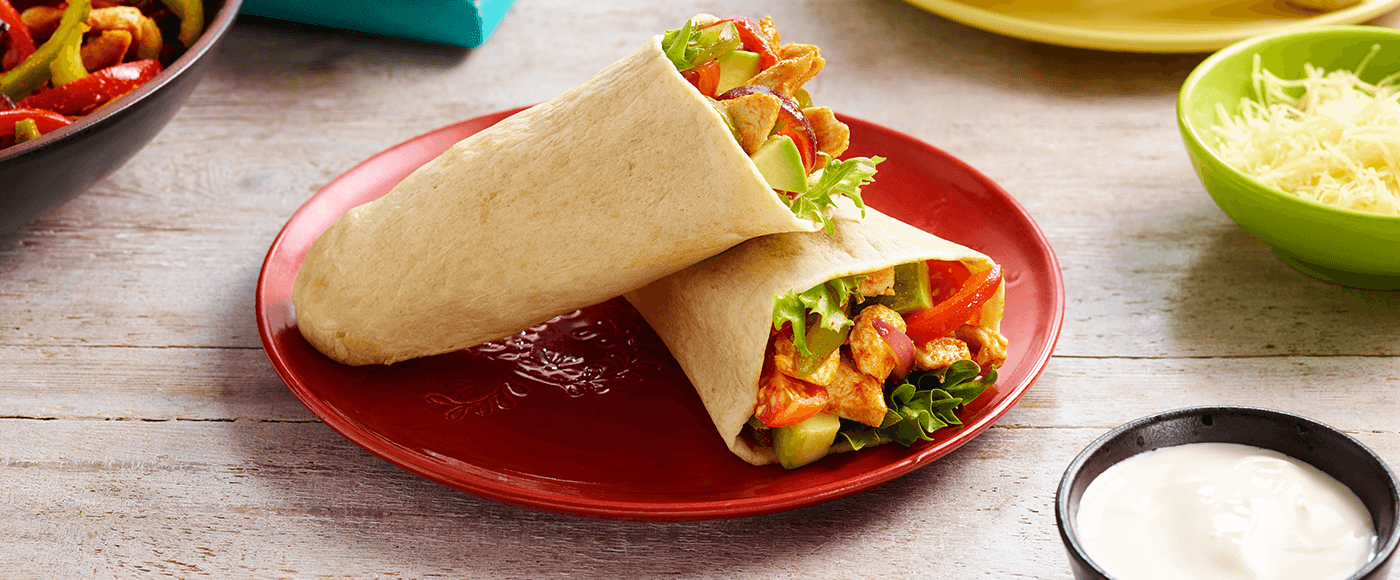 Chicken Fajita Tortilla Pockets served in a red plate